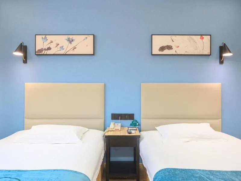 Bed in GreenTree Inn Henan Kaifeng Gulou Square Express hotel