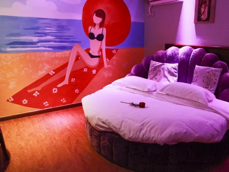 Bed in GreenTree Inn Jiangsu Wuxi Xibei Town Xingtiandi Shell Hotel