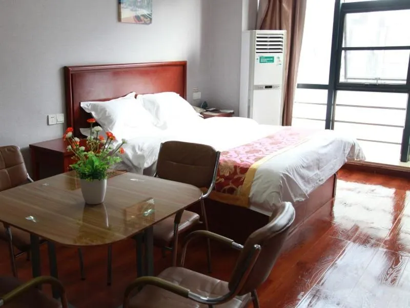 Bed in GreenTree Inn Jiangsu Wuxi Xibei Town Xingtiandi Shell Hotel