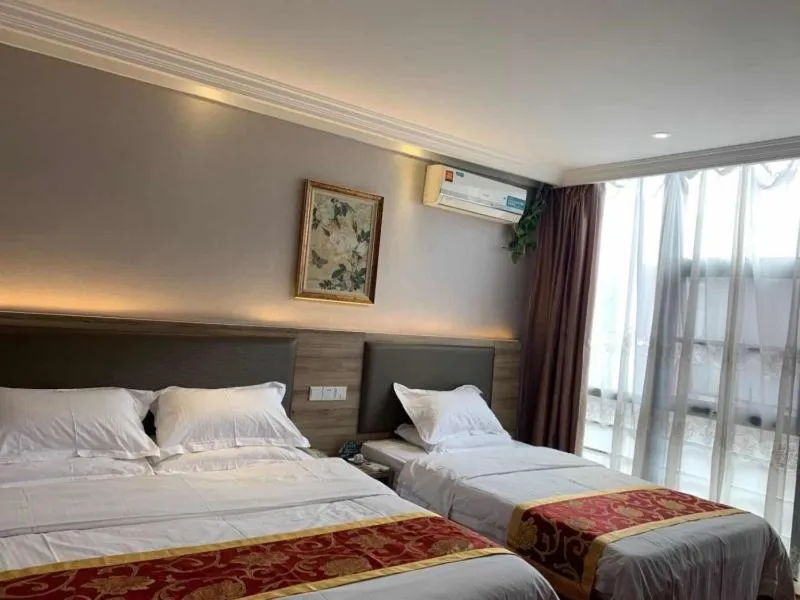 Bed in GreenTree Inn Jiangsu Wuxi Xibei Town Xingtiandi Shell Hotel