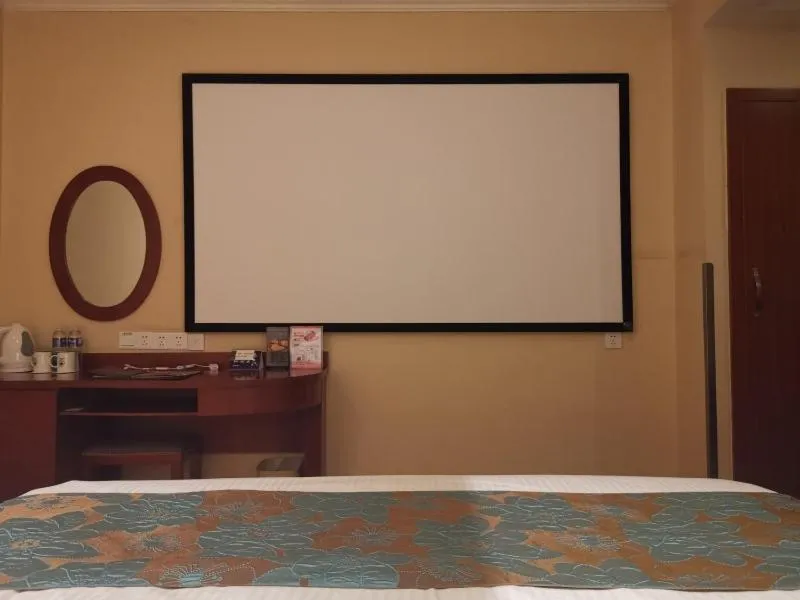 Bed in GreenTree Inn Jiangsu Wuxi Taihu Avenue Tongyang Road Express Hotel