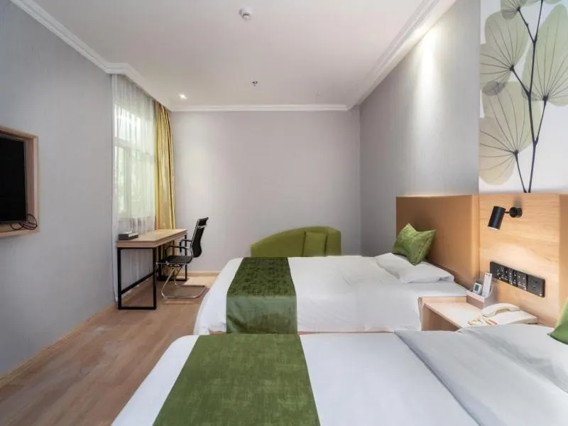 Bed in GreenTree Inn Jiangsu Wuxi Taihu Avenue Tongyang Road Express Hotel