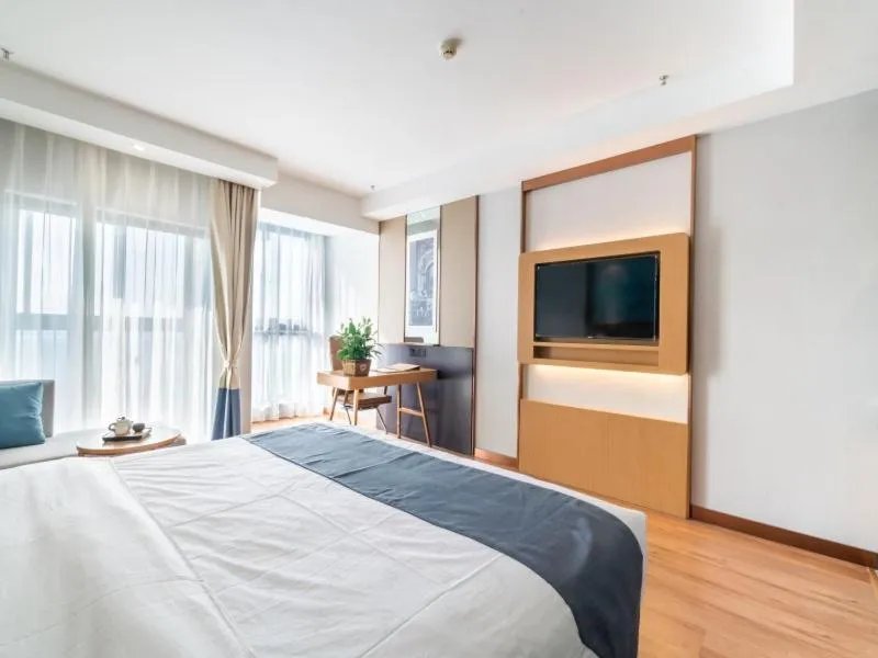 Bed in GreenTree Inn Jiangsu Wuxi Hudai FuAn Commercial Plaza Business Hotel