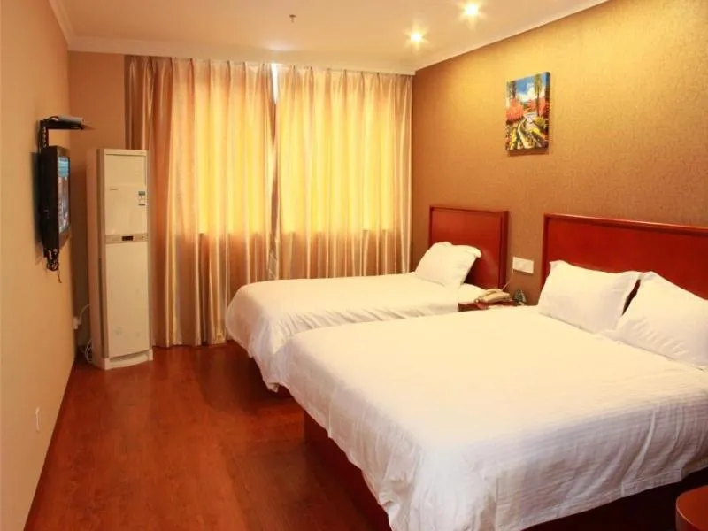 Bed in GreenTree Inn Jiangsu Suzhou Chang Shu Aotelaisi Business Hotel