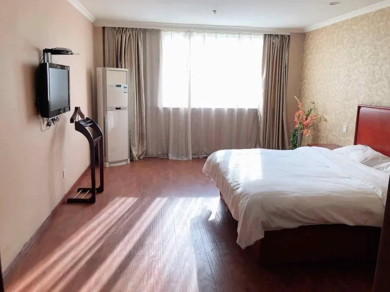 Bed in GreenTree Inn Jiangsu Suzhou Chang Shu Aotelaisi Business Hotel