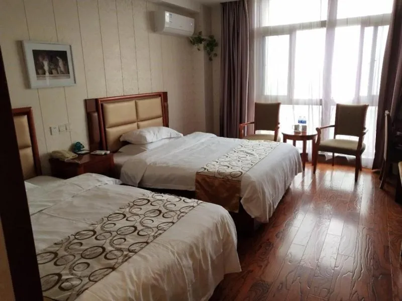 Bed in GreenTree Inn Jiangsu Nantong Development District Middle Road Business Hotel
