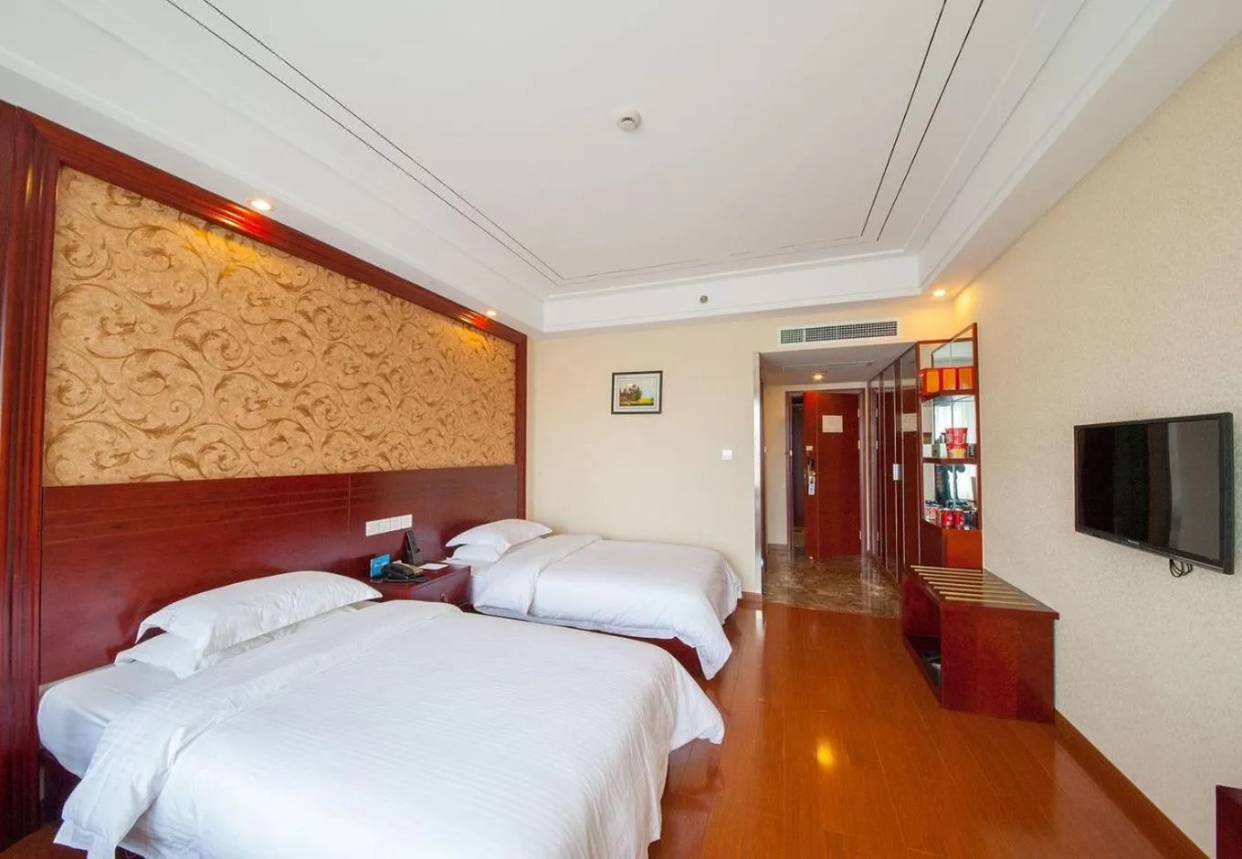 Bed in GreenTree Inn Jiangsu Nantong Haimen Sanchang North Wangjiang Road Business Hotel