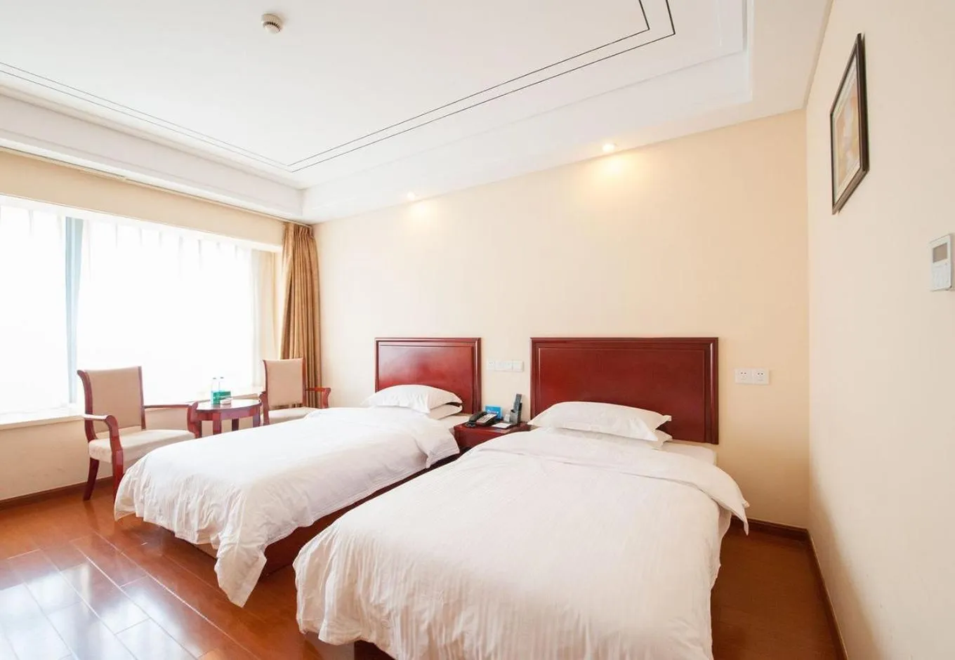 Bed in GreenTree Inn Jiangsu Nantong Haimen Sanchang North Wangjiang Road Business Hotel