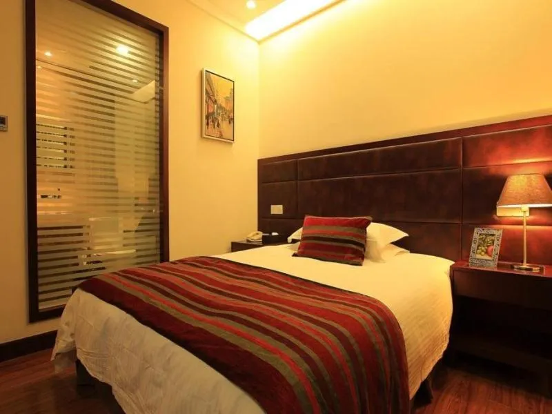 Bed in GreenTree Inn Jiangsu Nantong Qidong Middle Heping Road Business Hotel