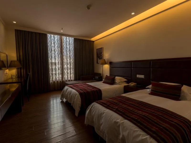 Bed in GreenTree Inn Jiangsu Nantong Qidong Middle Heping Road Business Hotel