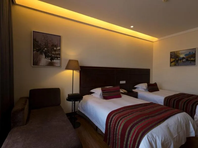 Bed in GreenTree Inn Jiangsu Nantong Qidong Middle Heping Road Business Hotel