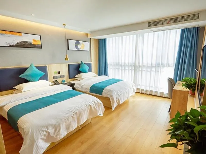 Bed in GreenTree Inn Jiangsu Nantong Textile City Bus Station Express Hotel