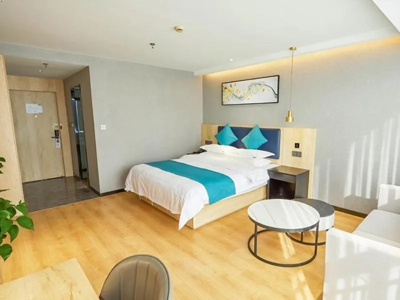 Bed in GreenTree Inn Jiangsu Nantong Textile City Bus Station Express Hotel