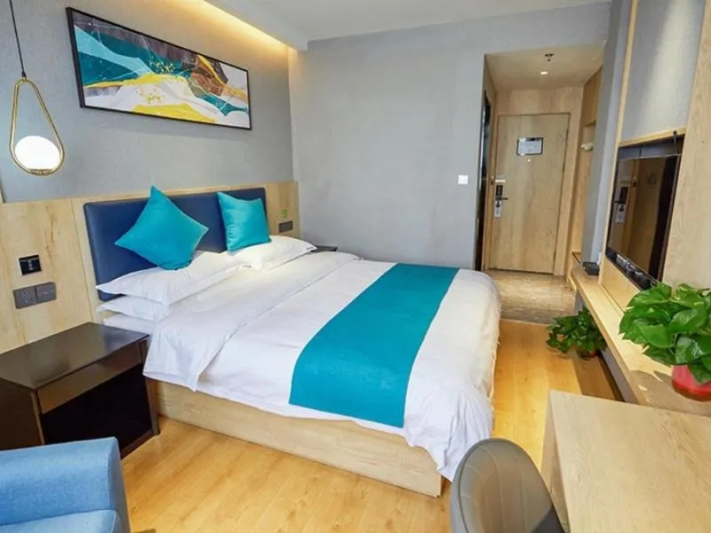 Bed in GreenTree Inn Jiangsu Nantong Textile City Bus Station Express Hotel