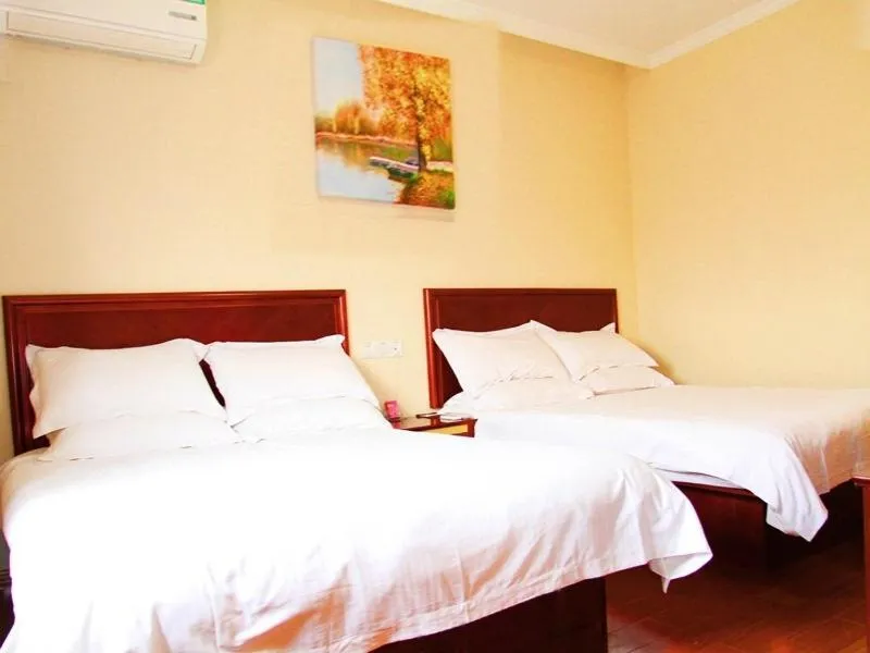 Bed in GreenTree Inn Jiangsu Nantong Rugao Ninghai Road Express Hotel