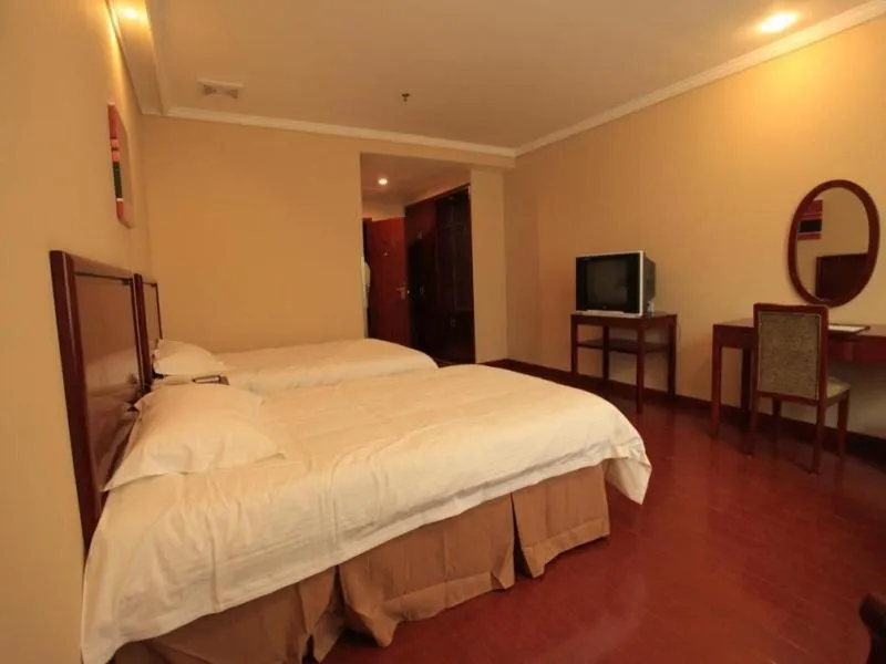 Bed in GreenTree Inn Yangzhou Slender West Lake South Gate Express Hotel