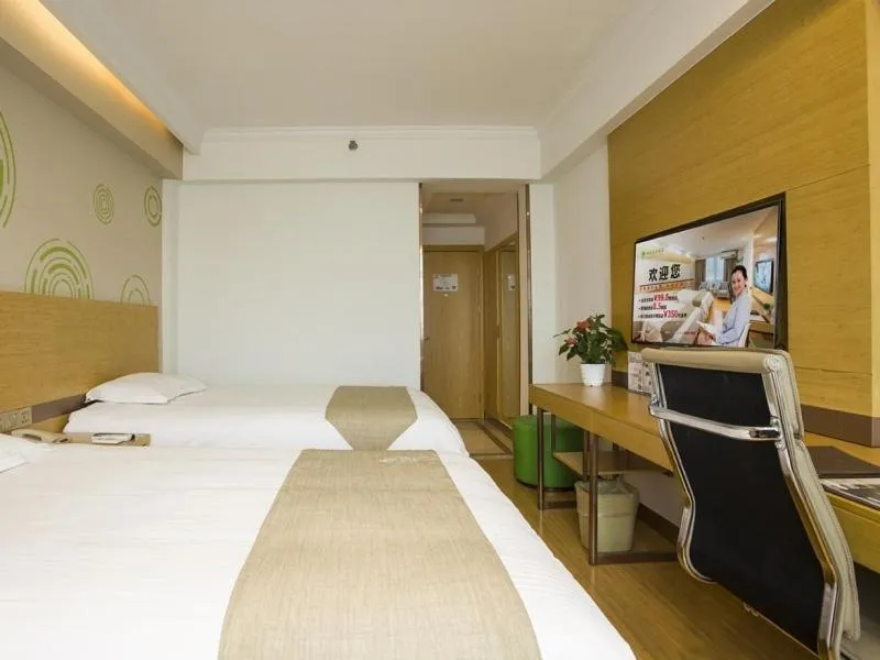 Bed in GreenTree Inn Jiangsu YangZhou Mansions Business Hotel