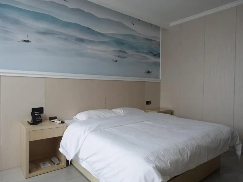 Bed in GreenTree Inn Jiangsu Yangzhou West Passenger Station Baixiang Road Express Hotel