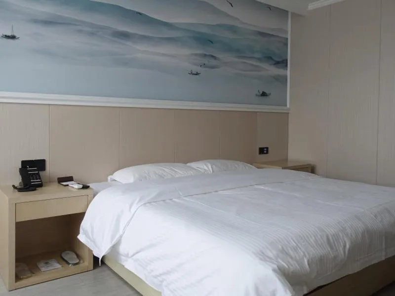 Bed in GreenTree Inn Jiangsu Yangzhou West Passenger Station Baixiang Road Express Hotel