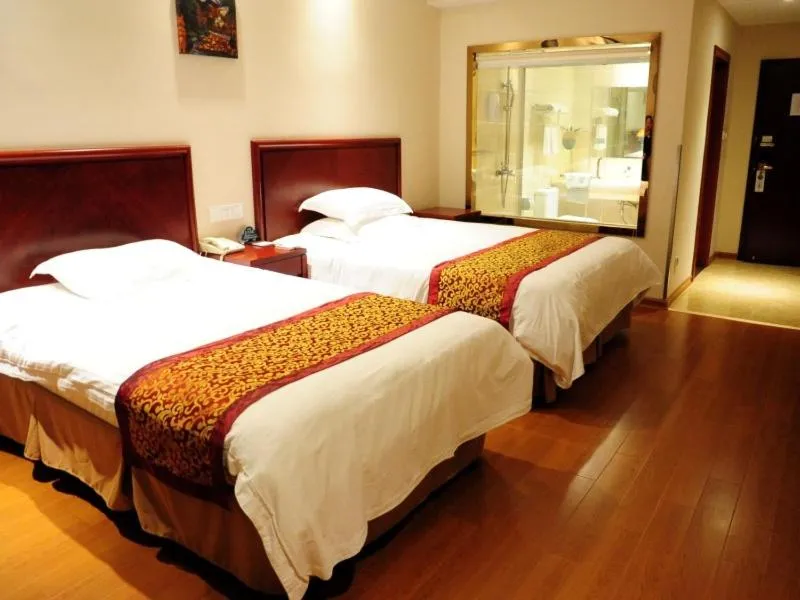 Bed in GreenTree Inn Jiangsu Yancheng Dongtai Jianggang Yingbin Road Gangcheng Avenue Business Hotel