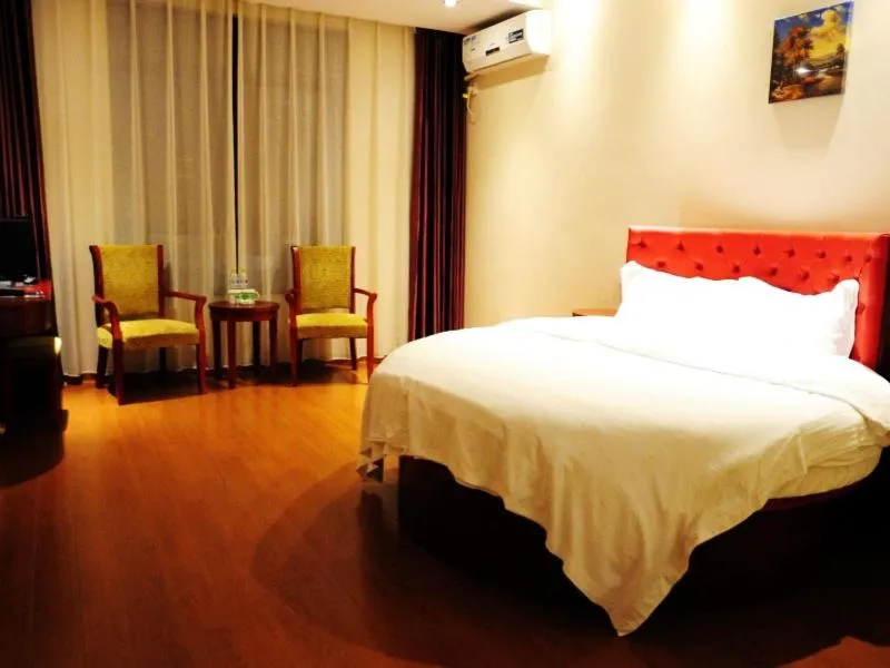 Bed in GreenTree Inn Jiangsu Yancheng Dongtai Jianggang Yingbin Road Gangcheng Avenue Business Hotel