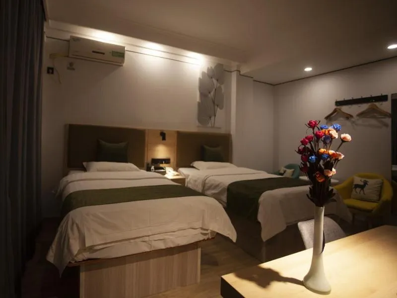 Bed in GreenTree Inn Jiangsu Lianyungang Guannan West Renmin Road Express Hotel