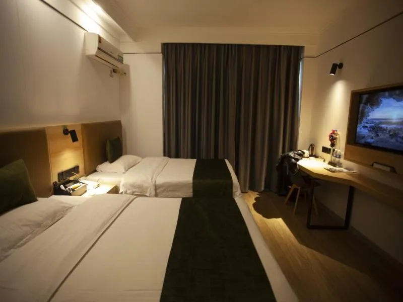 Bed in GreenTree Inn Jiangsu Lianyungang Guannan West Renmin Road Express Hotel