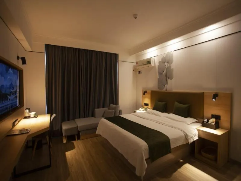 Bed in GreenTree Inn Jiangsu Lianyungang Guannan West Renmin Road Express Hotel