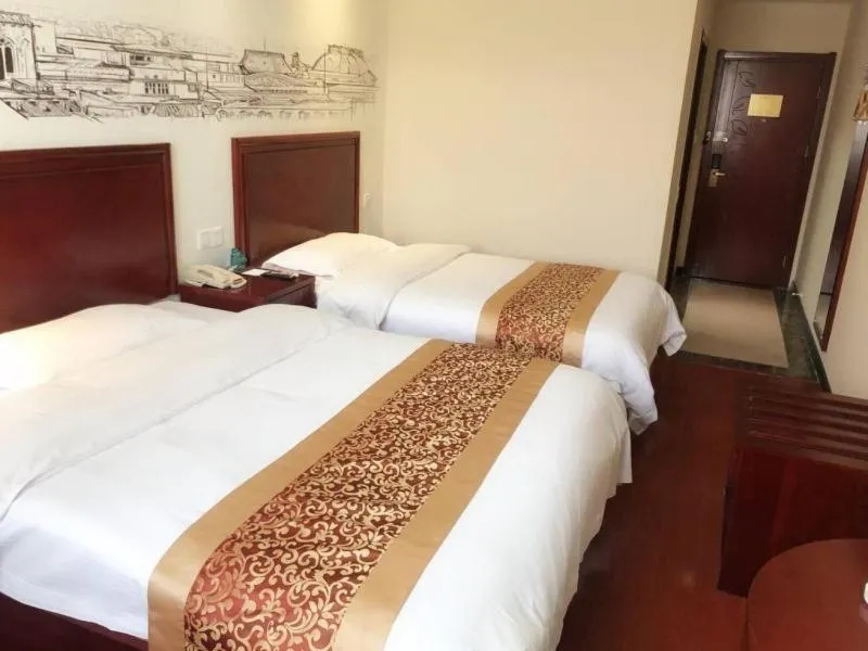 Bed in GreenTree Inn Jiangsu Lianyungang Donghai New Bus Station Express Hotel