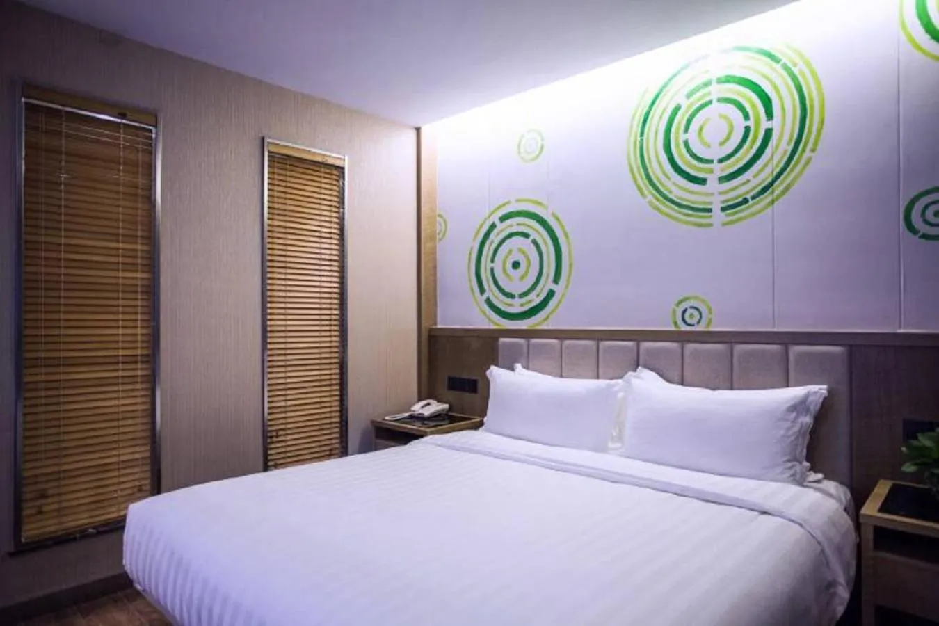 Bed in GreenTree Inn Jiangsu Taizhou Dongfeng Road Express Hotel