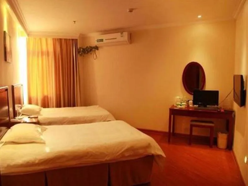 Bed in GreenTree Inn Jiangsu Taizhou Xinghua Anfeng Runan Garden Express Hotel