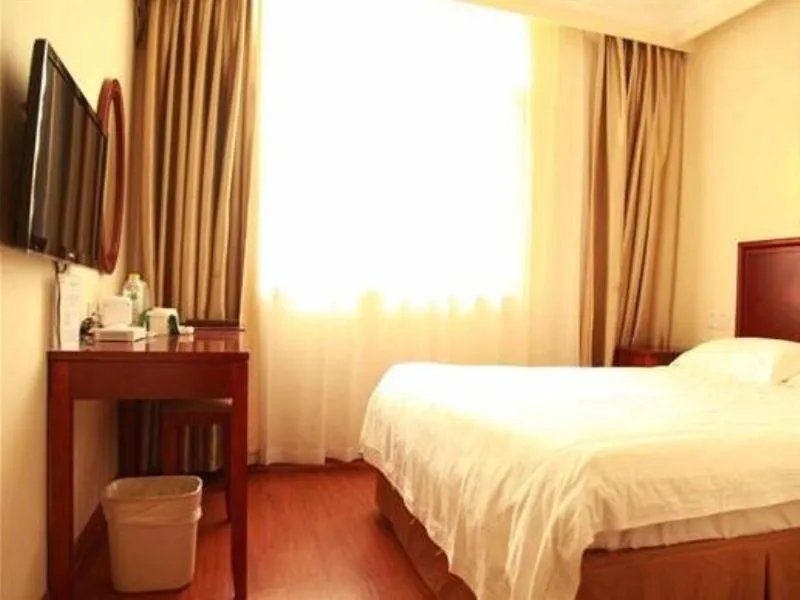 Bed in GreenTree Inn Jiangsu Taizhou Xinghua Anfeng Runan Garden Express Hotel