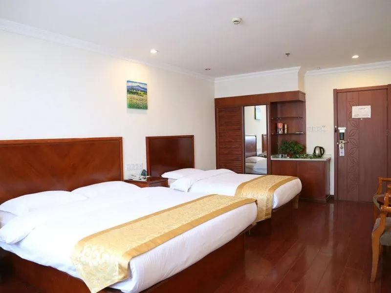 Bed in GreenTree Inn Jiangsu Taizhou Taidong Railway Station Business Hotel