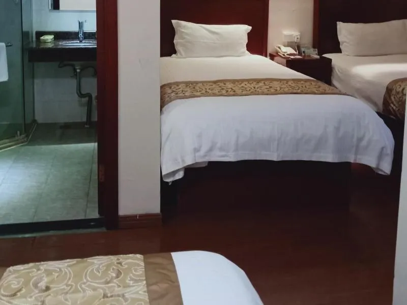 Bed in GreenTree Inn Jiangsu Taizhou Jingjiang Bus Station Express Hotel