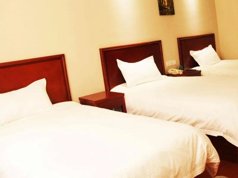 Bed in GreenTree Inn Shandong Qingdao Development District SDUST Express Hotel