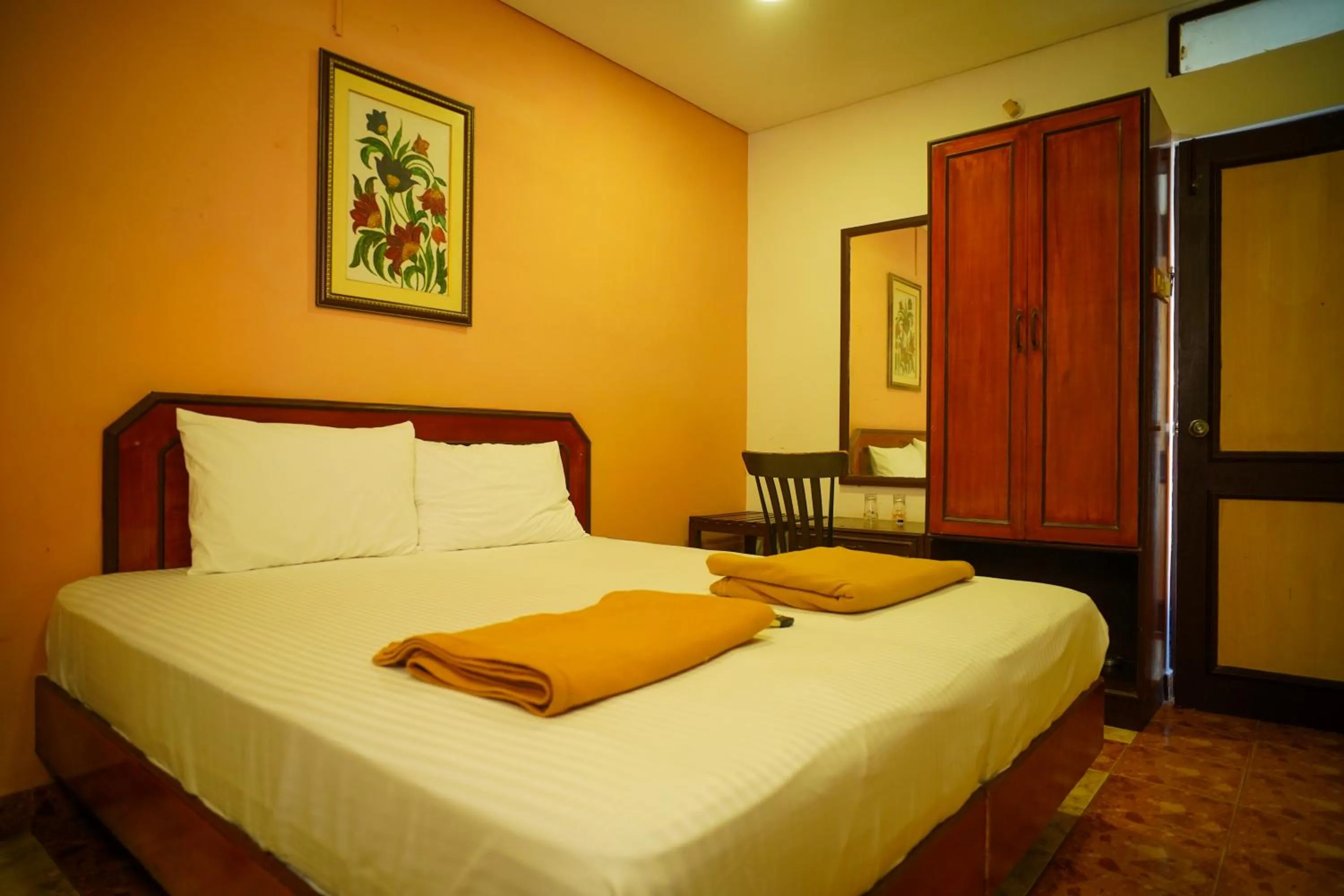 Bed in Hotel Raaj Bhaavan