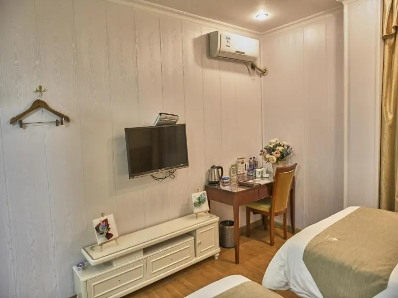 Bed in GreenTree Inn Guangdong Foshan Longjiang North Fenghua Road Express Hotel