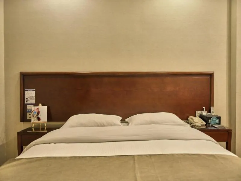 Bed in GreenTree Inn Guangdong Foshan Longjiang North Fenghua Road Express Hotel