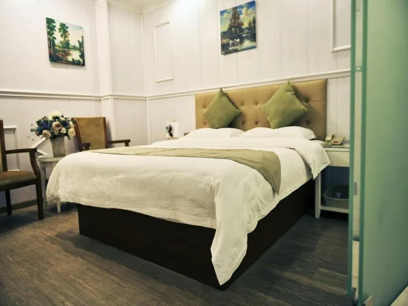 Bed in GreenTree Inn Guangdong Foshan Longjiang North Fenghua Road Express Hotel