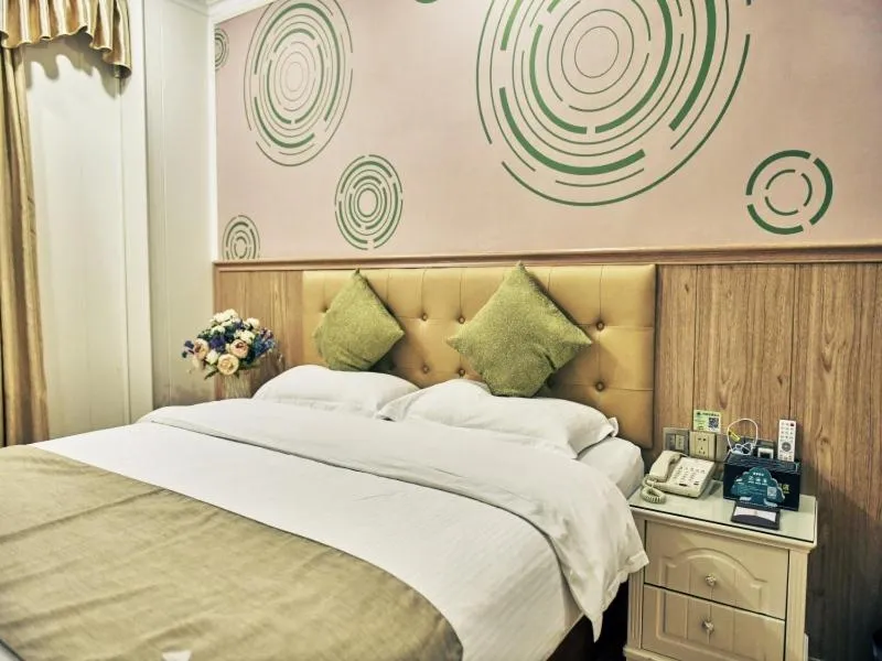 Bed in GreenTree Inn Guangdong Foshan Longjiang North Fenghua Road Express Hotel