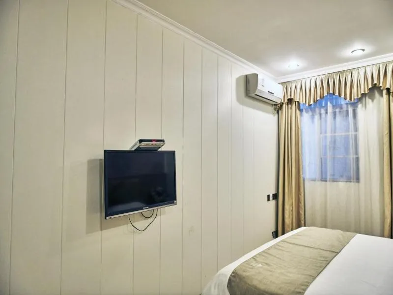 Bed in GreenTree Inn Guangdong Foshan Longjiang North Fenghua Road Express Hotel