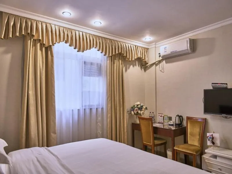 Bed in GreenTree Inn Guangdong Foshan Longjiang North Fenghua Road Express Hotel