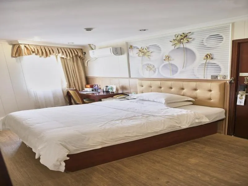 Bed in GreenTree Inn Guangdong Foshan Longjiang North Fenghua Road Express Hotel