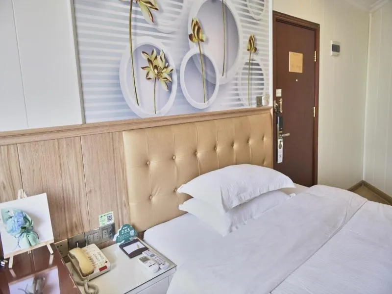 Bed in GreenTree Inn Guangdong Foshan Longjiang North Fenghua Road Express Hotel