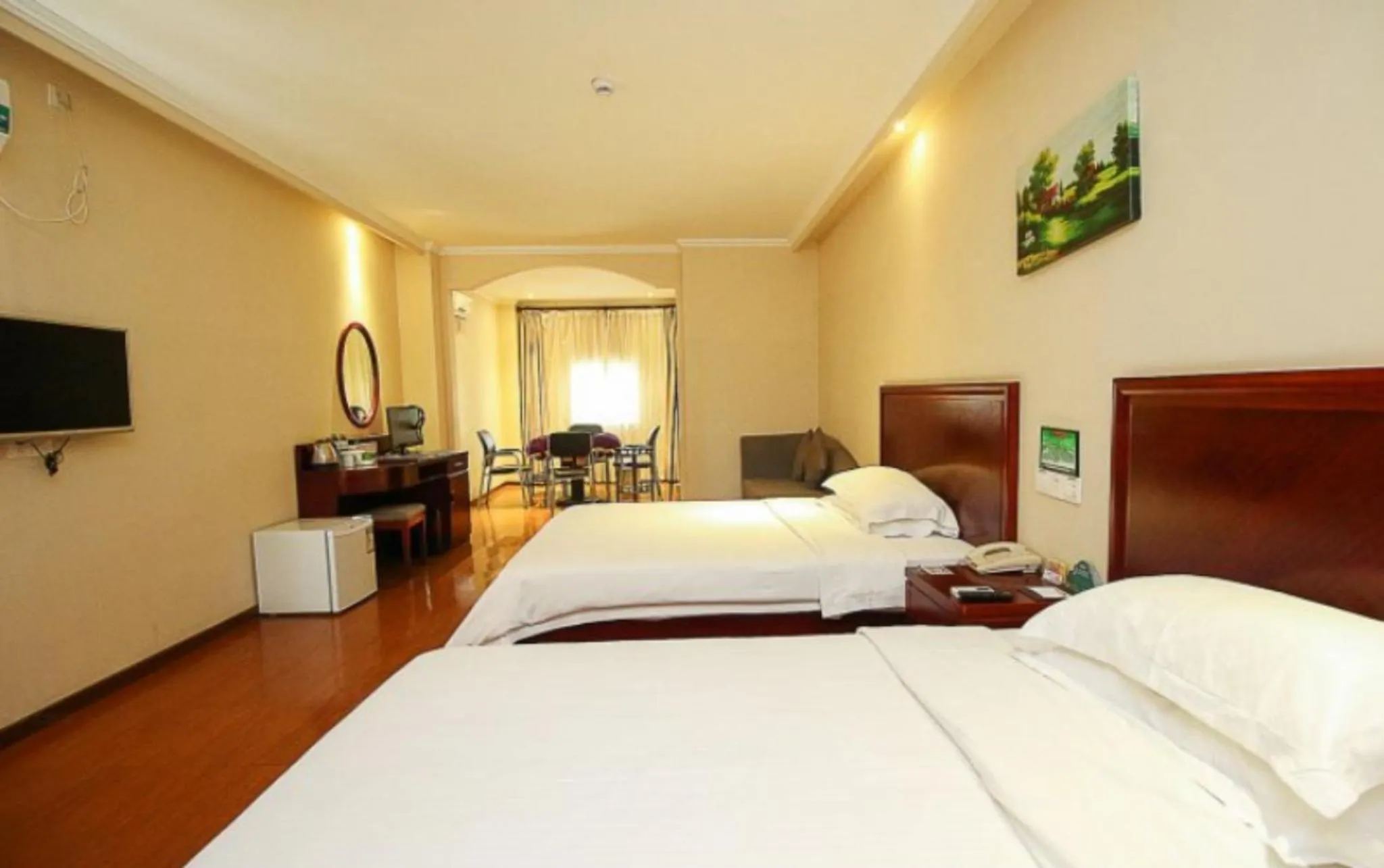 Bed in GreenTree Inn Hainan Haikou Guomao Business Hotel