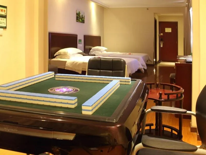 Bed in GreenTree Inn Hainan Haikou Guomao Business Hotel