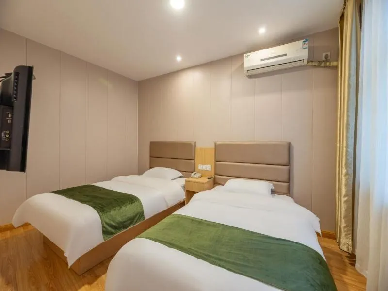 Bed in GreenTree Inn Shandong Jining Railway Station Express Hotel