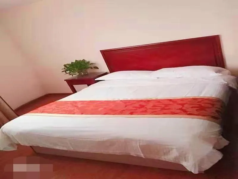 Bed in GreenTree Inn Shandong Jining Zoucheng South Yishan Road Experimental Middle School Express Hotel