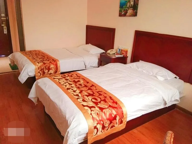 Bed in GreenTree Inn Shandong Jining Zoucheng South Yishan Road Experimental Middle School Express Hotel