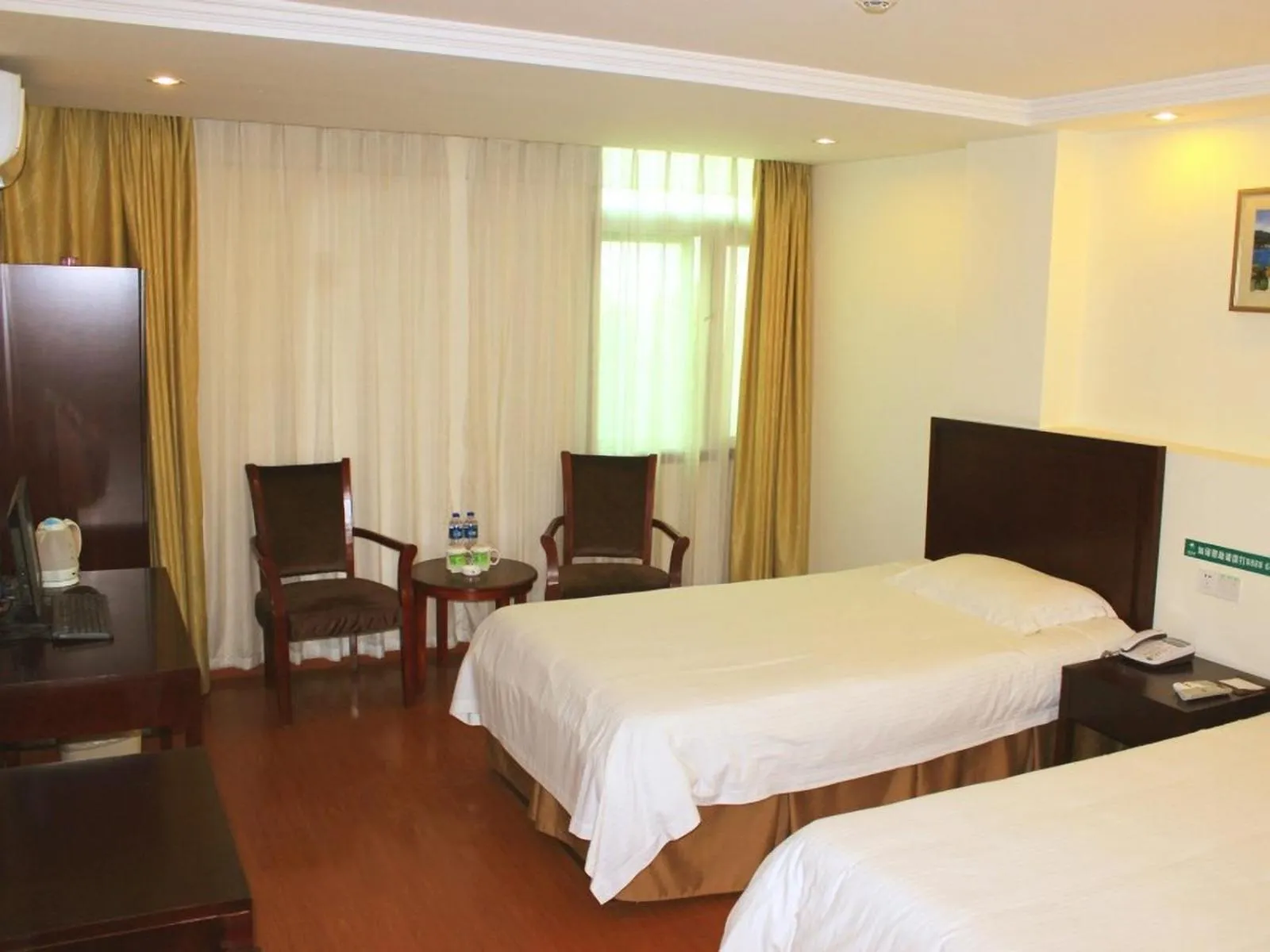 Bed in GreenTree Inn Anhui Huainan Liulizhan Express Hotel